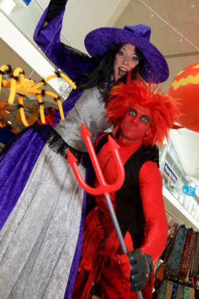 Witch and Devil Stilt Walkers
