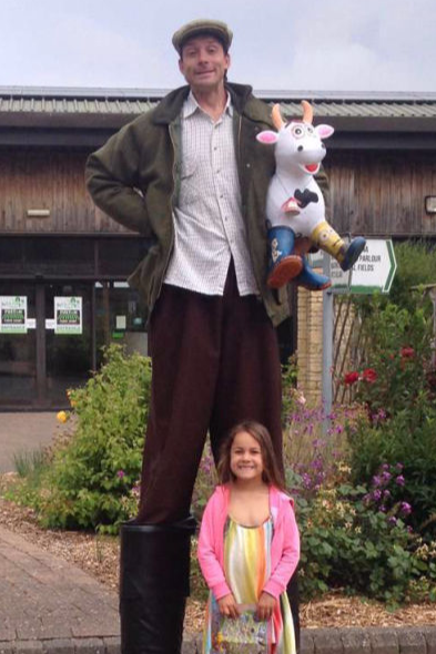 Farmer Stilt Walker and Friend